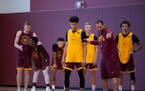 Gophers coach Ben Johnson explained a drill to guard Eylijah Stephens at the team’s first practice Tuesday afternoon. 