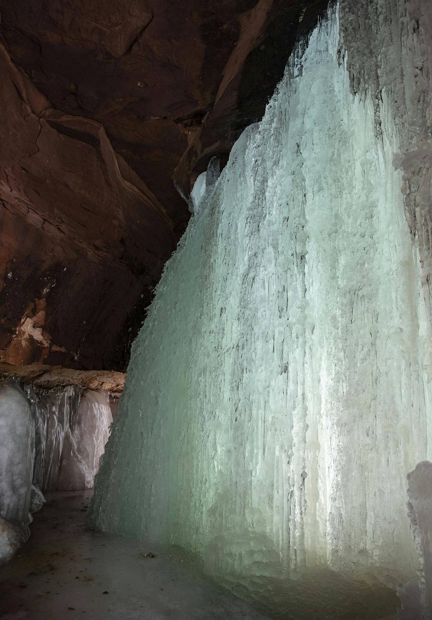 A cave and ice formation nicknamed "big blue" is considered the most impressive of the formations on Red Cliff Point. ]
ALEX KORMANN &#x2022; alex.kormann@startribune.com While not being the famed Apostle Islands National Lakeshore ice caves, the new ice formations on the south shore of Lake Superior near Bayfield, WI are still drawing interest. Jon Michaels and Travis Barningham lead tours to the formations on the Red Cliff reservation almost every day.