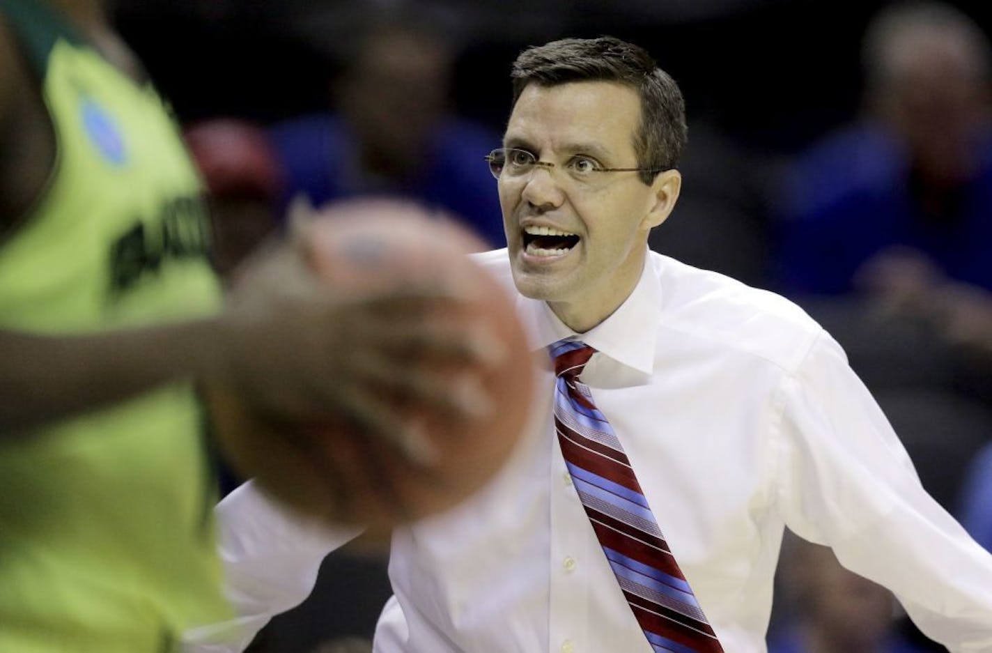 Nebraska coach Tim Miles yells at an official during the first half of a second-round game against Baylor in the NCAA college basketball tournament Friday, March 21, 2014, in San Antonio.