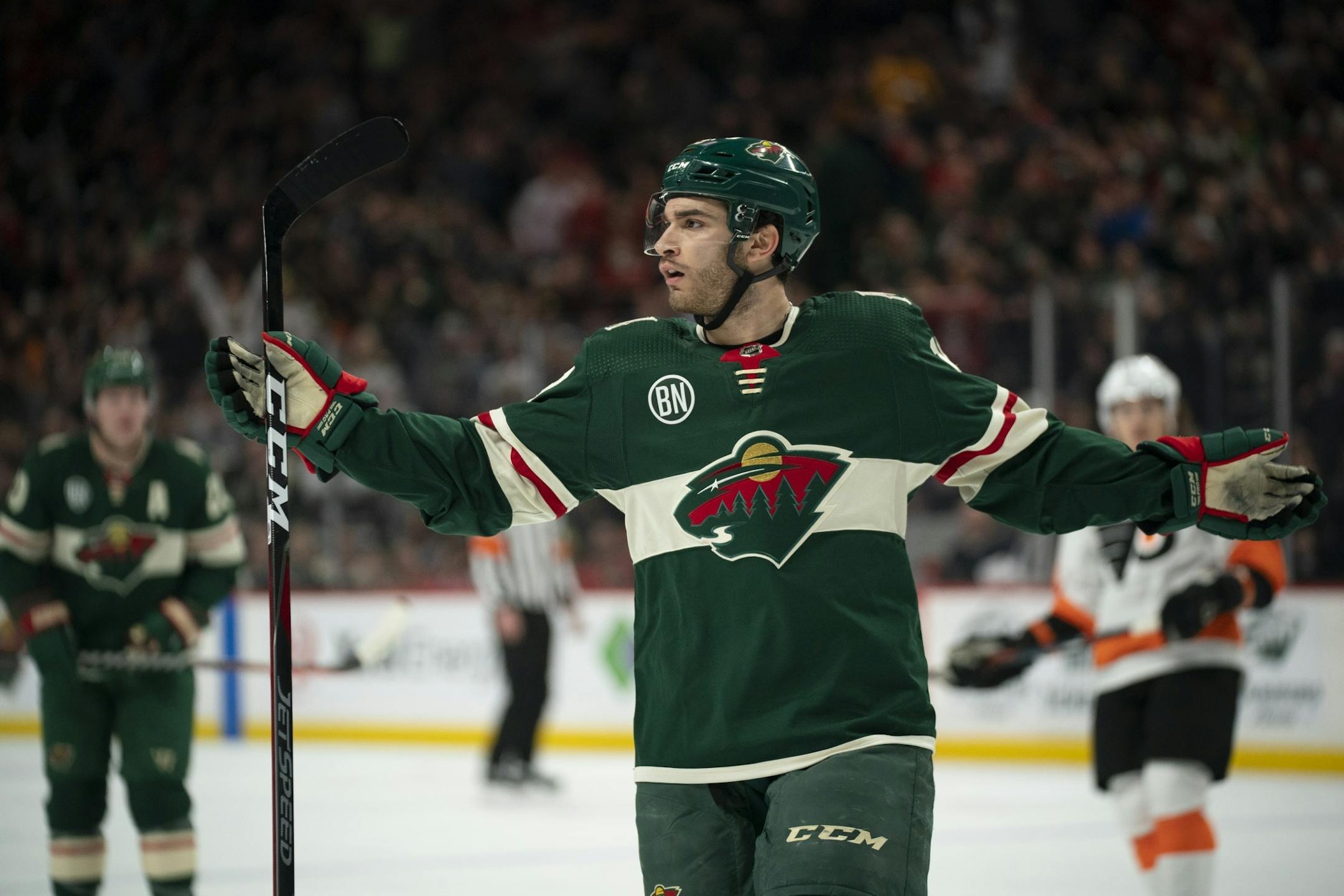 Minnesota Wild center Luke Kunin (19) celebrated the first of his two first period goals.