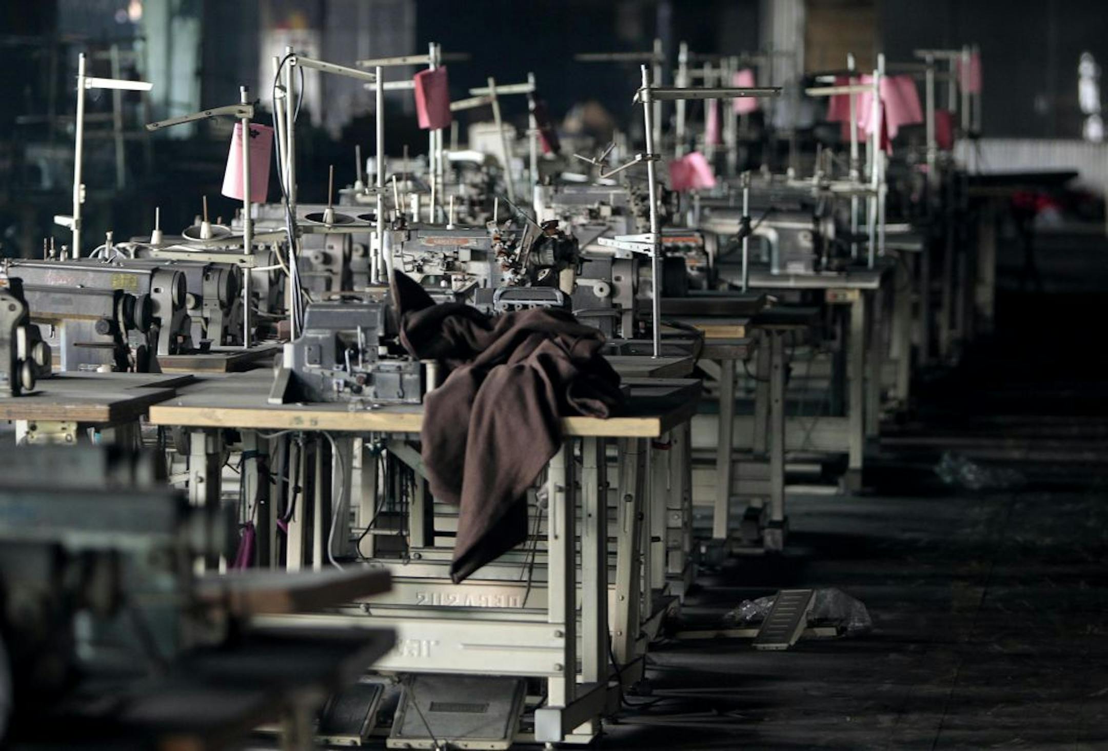 Machinery is seen at the Tazreen garment factory on the outskirts of Dhaha, Bangladesh, Friday, Dec. 7, 2012. The Bangladeshi garment factory that was producing clothes for Wal-Mart, Disney and other major Western companies had lost its fire safety certification in June, five months before a blaze in the facility killed 112 workers, a fire official said.