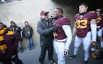 Former Minnesota Head Coach Jerry Kill greeted senior players including Minnesota's wide receiver KJ Maye before the Minnesota Gophers took on the Wis