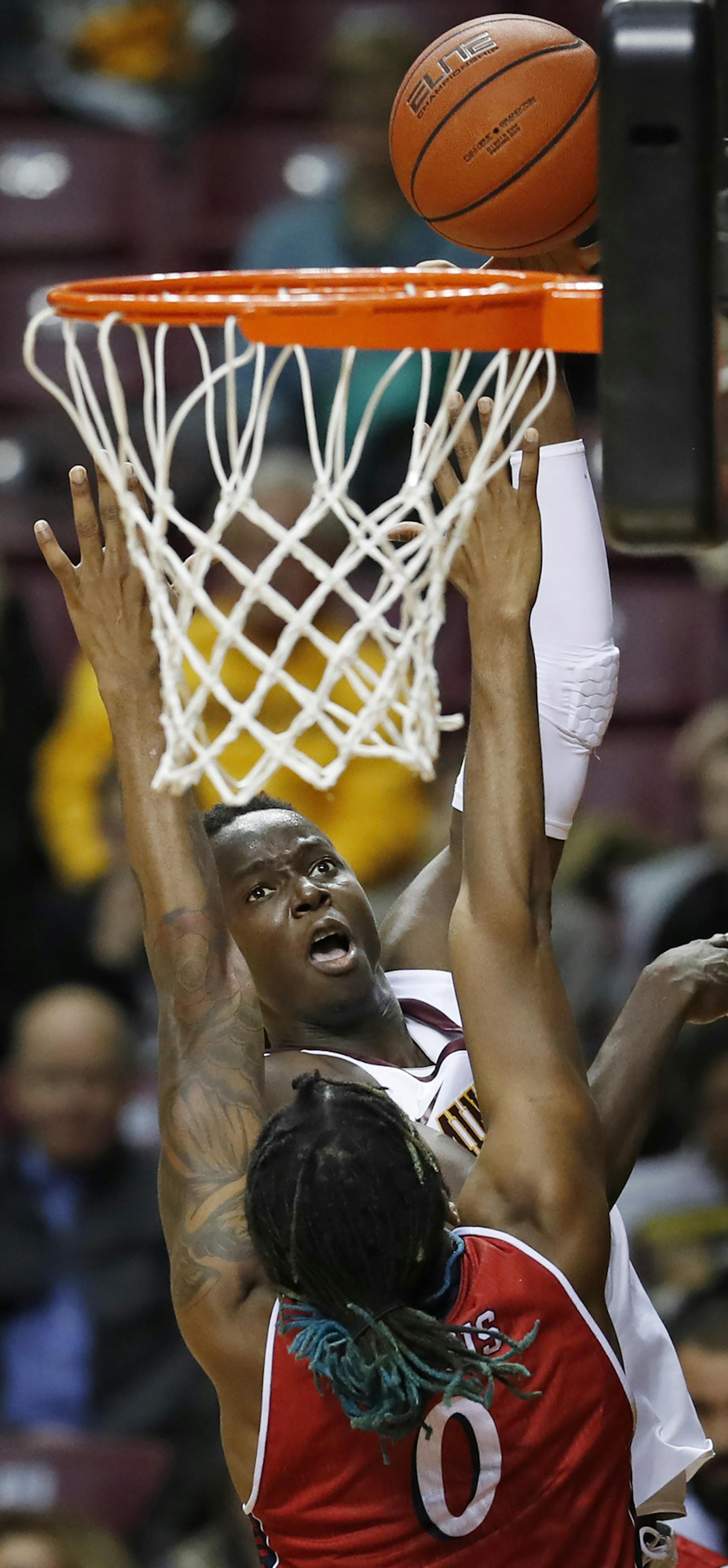 Minnesota Golden Gophers center Bakary Konate (21) shoots a hook shot over N.J.I.T Highlanders forward Abdul Lewis (0) in the first half at Williams Arena December 06,2016 in Minneapolis , MN. ] The University of Minnesota hosted New Jersey Institute of Technology. Jerry Holt / jerry. Holt@Startribune.com