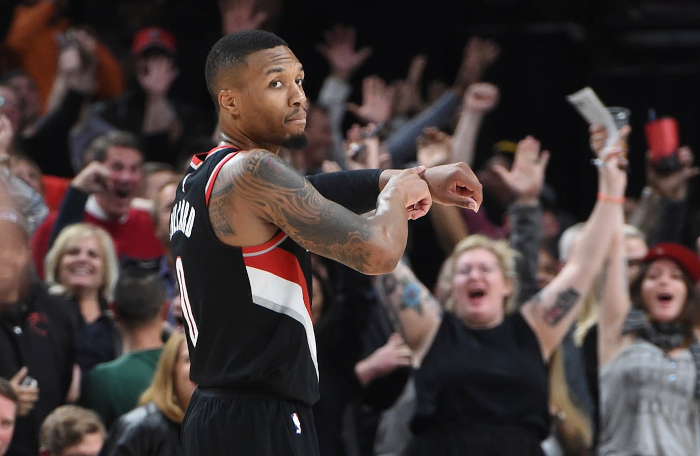 Portland Trail Blazers guard Damian Lillard reacts after hitting a shot in the final seconds of an NBA basketball game against the Los Angeles Lakers in Portland, Ore., Thursday, Nov. 2, 2017. The Blazers won 113-110. (AP Photo/Steve Dykes)