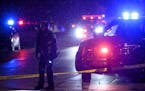 Minneapolis Police investigated the scene where a shooting victim was found dead on Lyndale Avenue North near 18th Avenue North Friday night. ] Aaron 