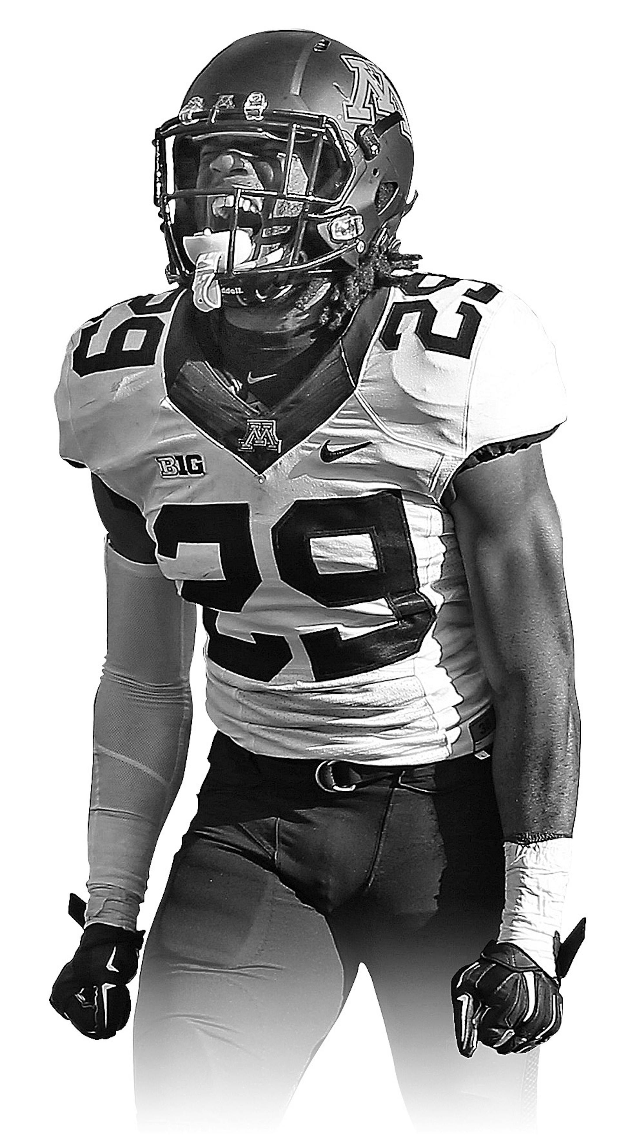 Minnesota's defensive back Briean Boddy-Calhoun (29) and defensive back Eric Murray (31) celebrated a turnover in the fourth quarter as the Minnesota Gophers took on the Nebraska Cornhuskers at Memorial Stadium, Saturday, November 22, 2014 in Lincoln, NE. ] (ELIZABETH FLORES/STAR TRIBUNE) ELIZABETH FLORES • eflores@startribune.com