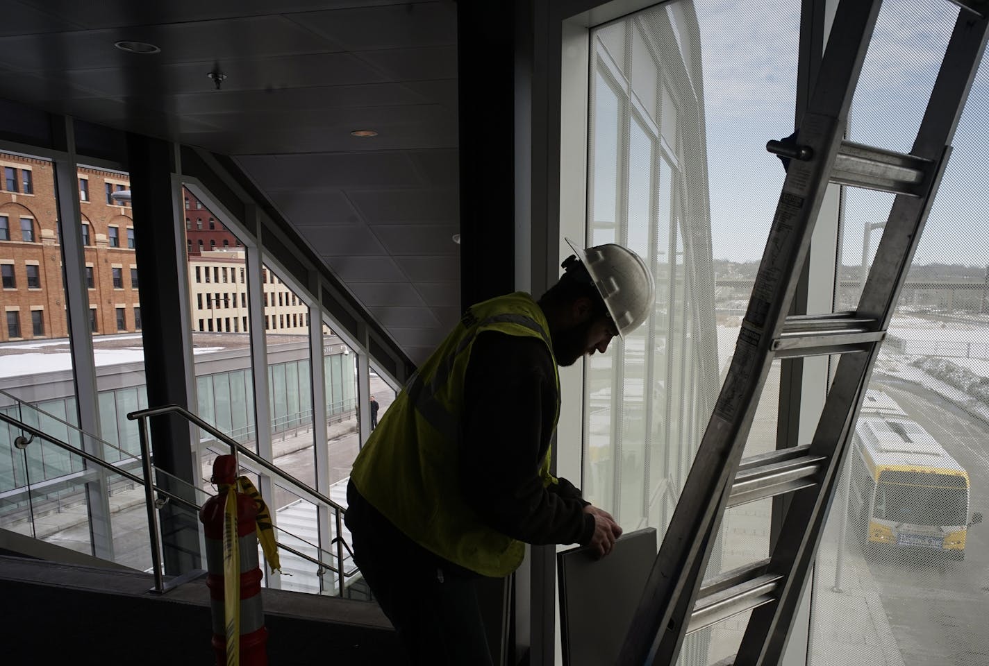 At the Union Depot in St. Paul, VP Biden will be visiting after a $243 million transformation of the transit hub. Sheet metal worker Nick Moga installed some insulation.] Richard Tsong-Taatarii/rtsong-taatarii@startribune.com