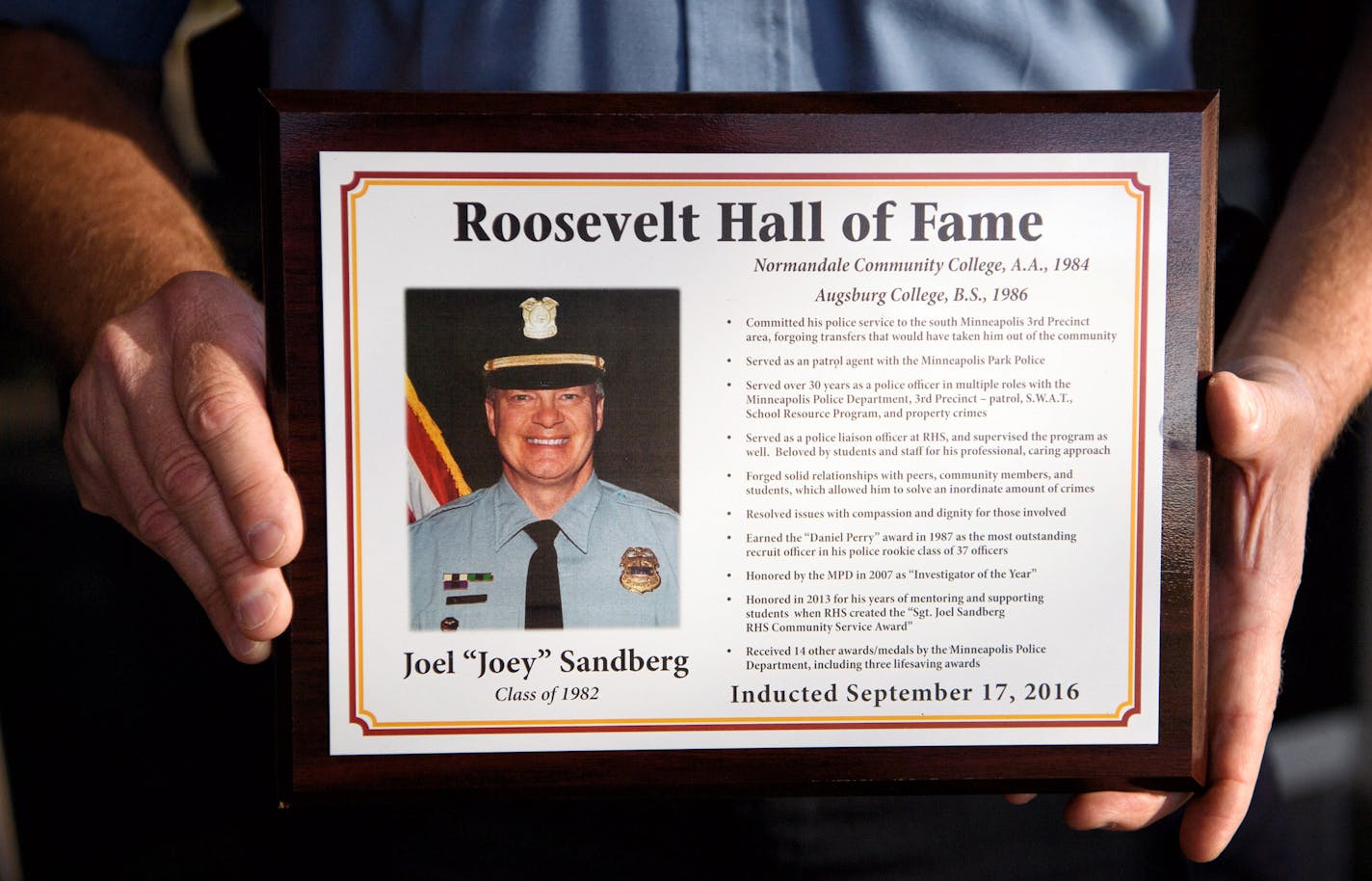 Sgt. Joey Sandberg, a longtime Minneapolis cop has spent most of his career working on the South Side, where he grew up. He spent much of his career working as a school resource officer at Roosevelt High, his alma mater. He was recently inducted into the school's hall of fame. ] GLEN STUBBE * gstubbe@startribune.com Tursday, September 27, 2016