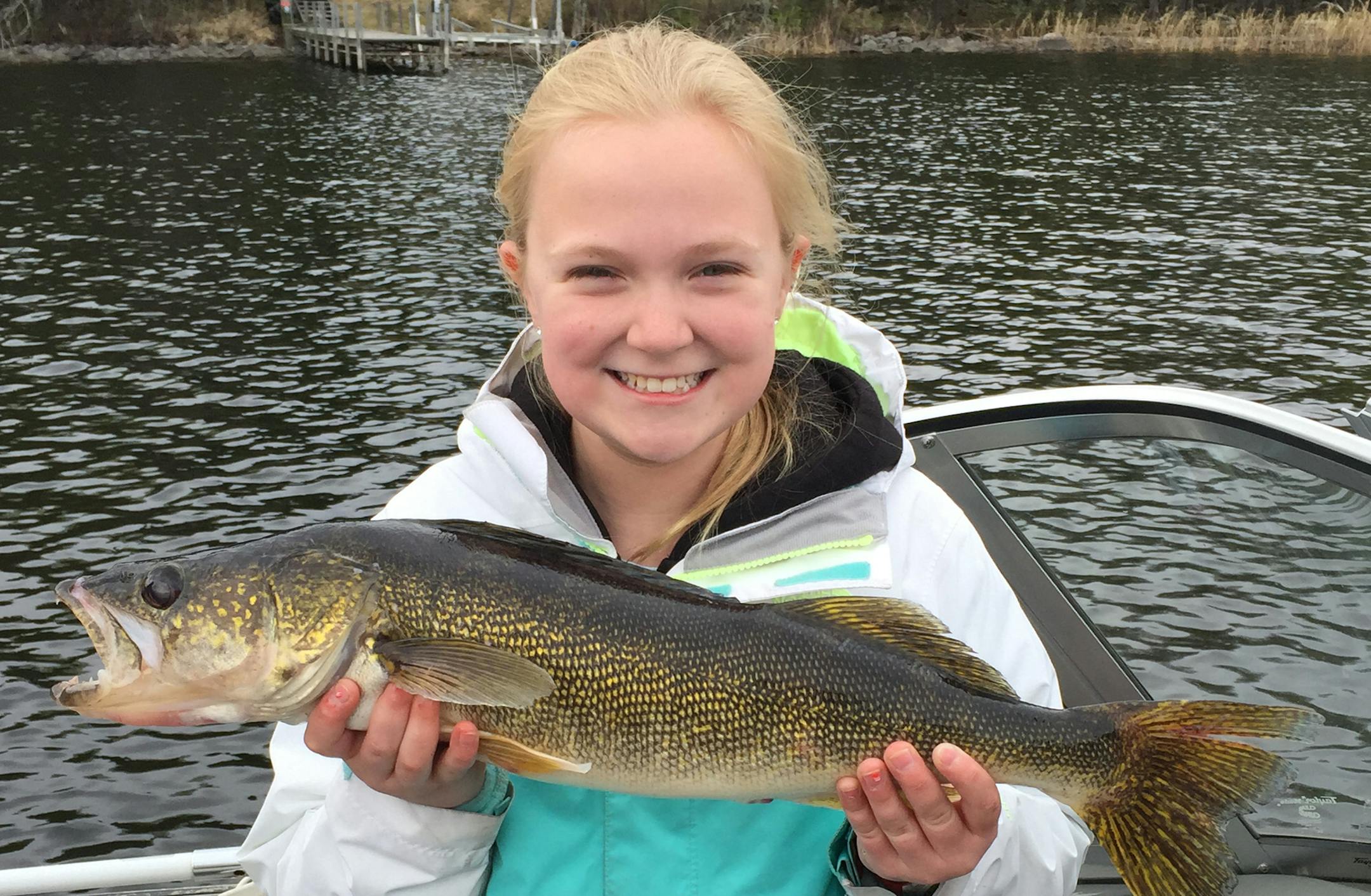 Caroline Scheldrup, 12, of Plymouth, with a 24-inch walleye she caught on Mother's Day at Lake Vermilion.