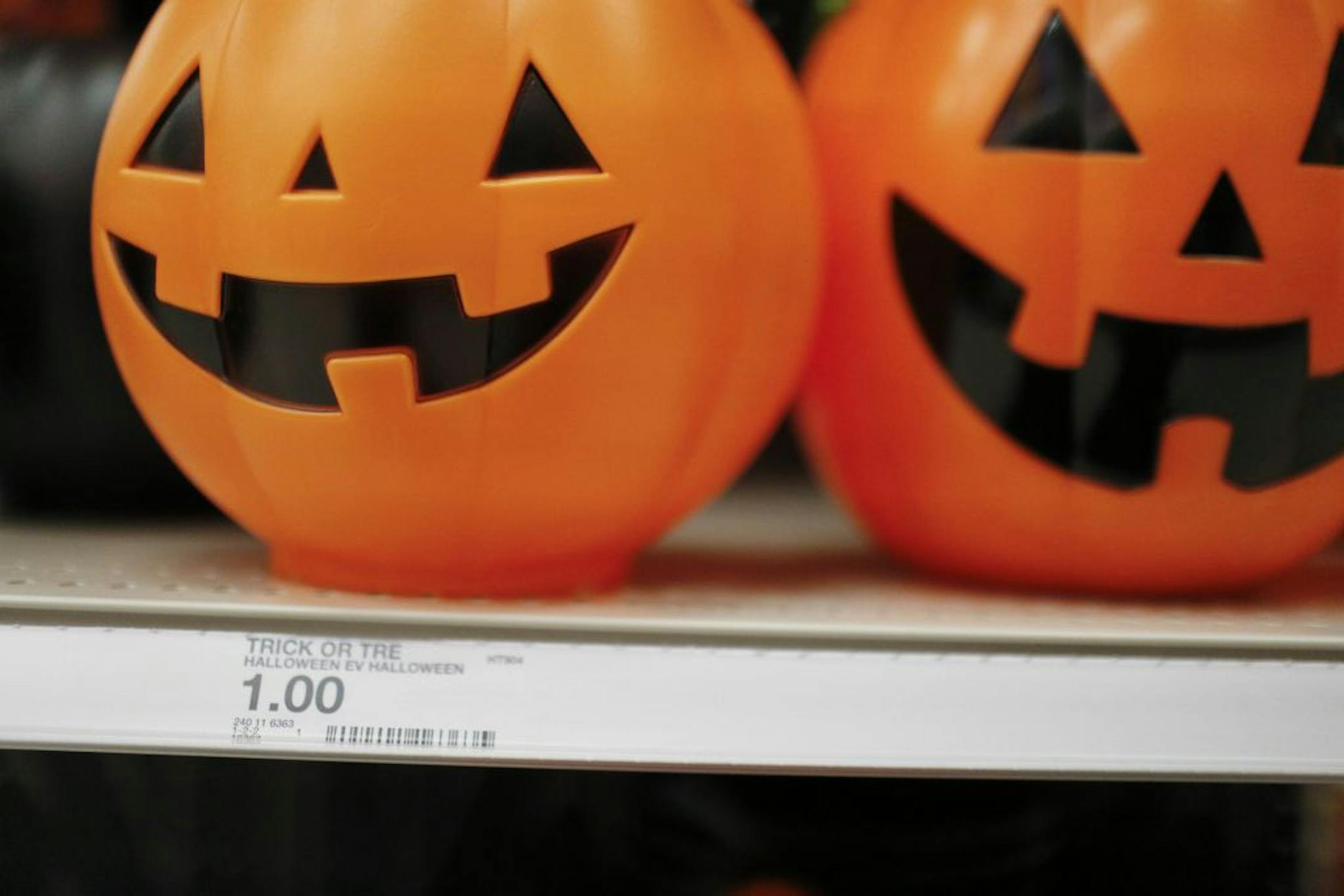 A pumpkin bucket is displayed in the Halloween section called "Hyde and Eek" at a Target department store on Wednesday, Oct. 3, 2018, in Pembroke Pines, Fla. Discounters like Walmart and Target are expanding their costume offerings and creating designated sections where customers can find more of their Halloween needs in one place.