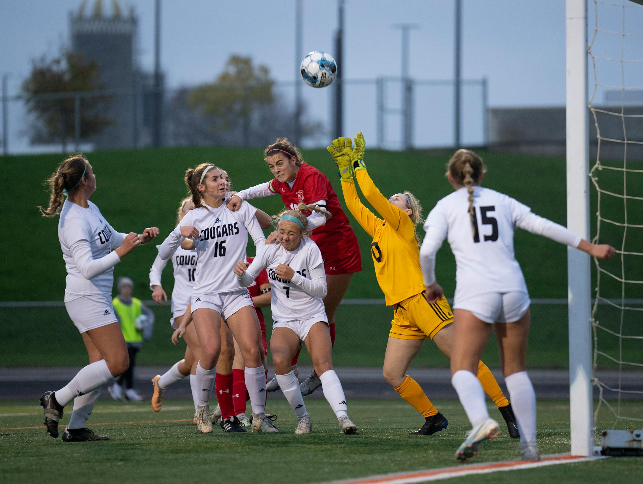 Mankato East keeper Ashley Fischer reached for a ball after a Benilde-St. Margaret's corner kick in the first half.