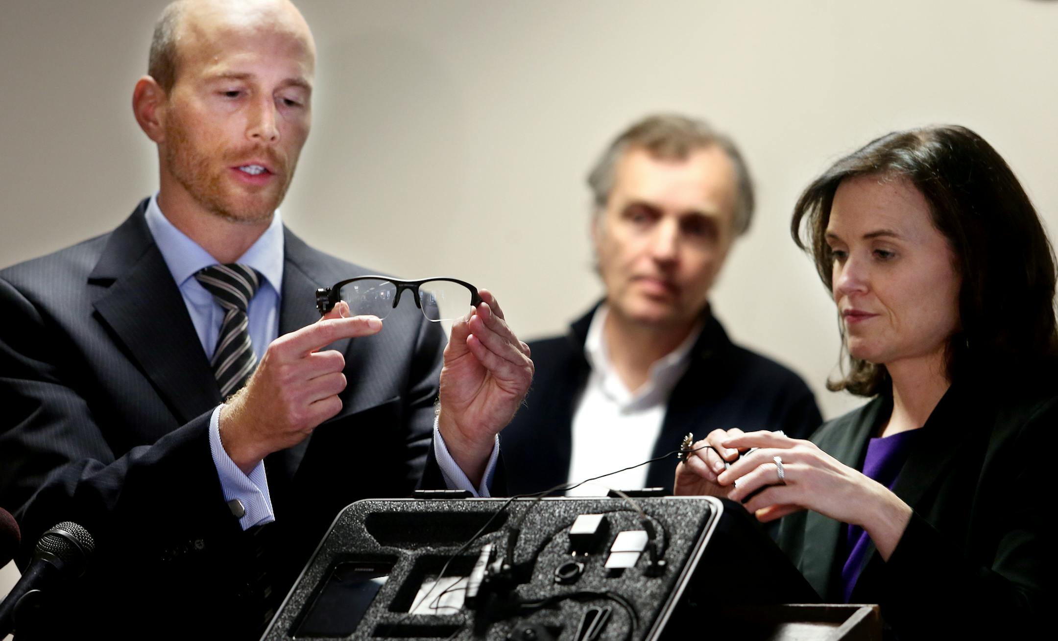 City Councilman Gary Schiff and Betsy Hodges demonstrated the new body work camera system to be used by Minneapolis cops. Council member Cam Gordon (middle) is in the background. Minneapolis, MN on October 17, 2013. ] JOELKOYAMA&#x201a;&#xc4;&#xa2;joel koyama@startribune City Council member Betsy Hodges hold news conference to discuss pilot program for body cam system to be worn by Minneapolis cops on the same day a police spokesman denied there is any news on the issue. "It's not even looking l