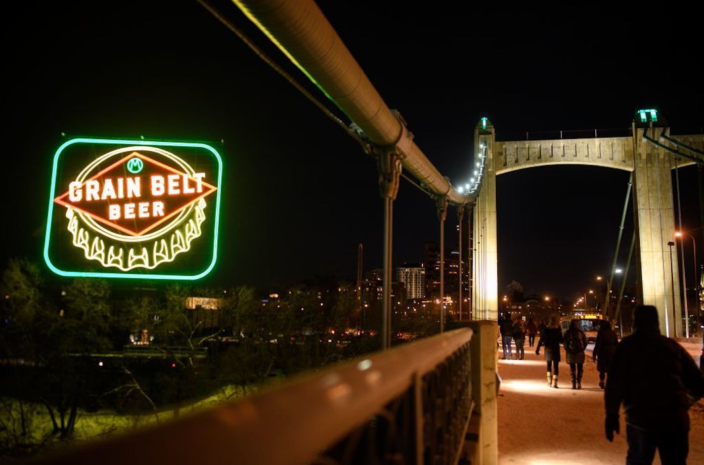 The relit Grain Belt sign Saturday night as seen from the Hennepin Bridge.