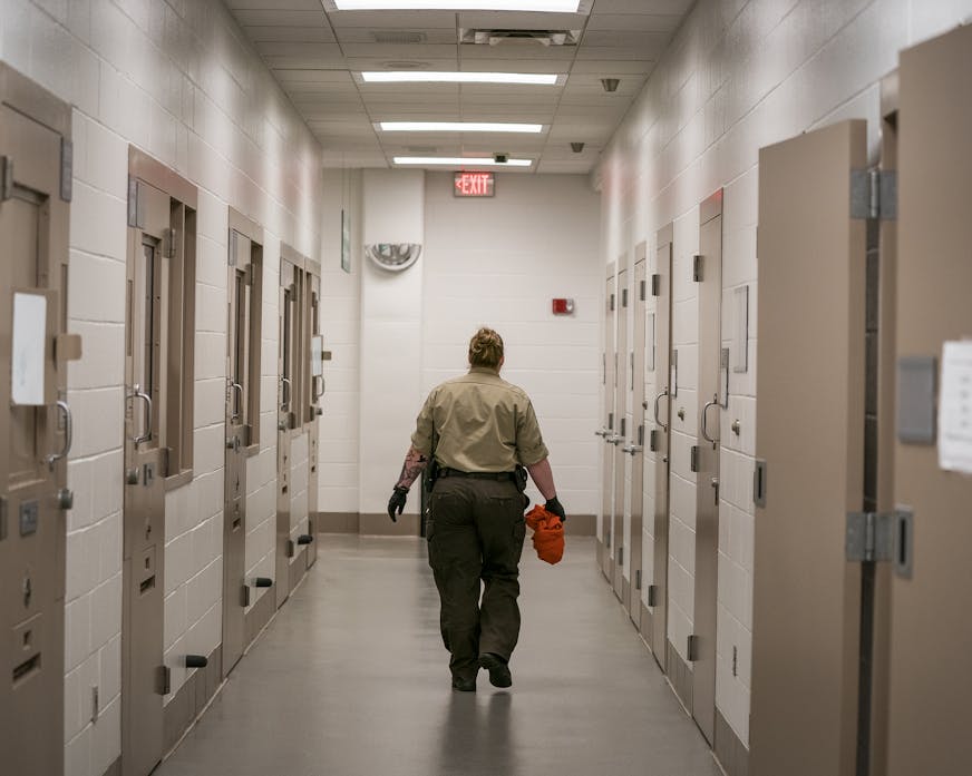 A deputy walks down the hallway of the intake area in the basement of the Hennepin County Jail. ] LEILA NAVIDI &#xa5; leila.navidi@startribune.com BACKGROUND INFORMATION: The Hennepin County Jail in downtown Minneapolis seen on Tuesday, April 23, 2019. The Hennepin County Jail will be participating in the Doors Open Minneapolis event.