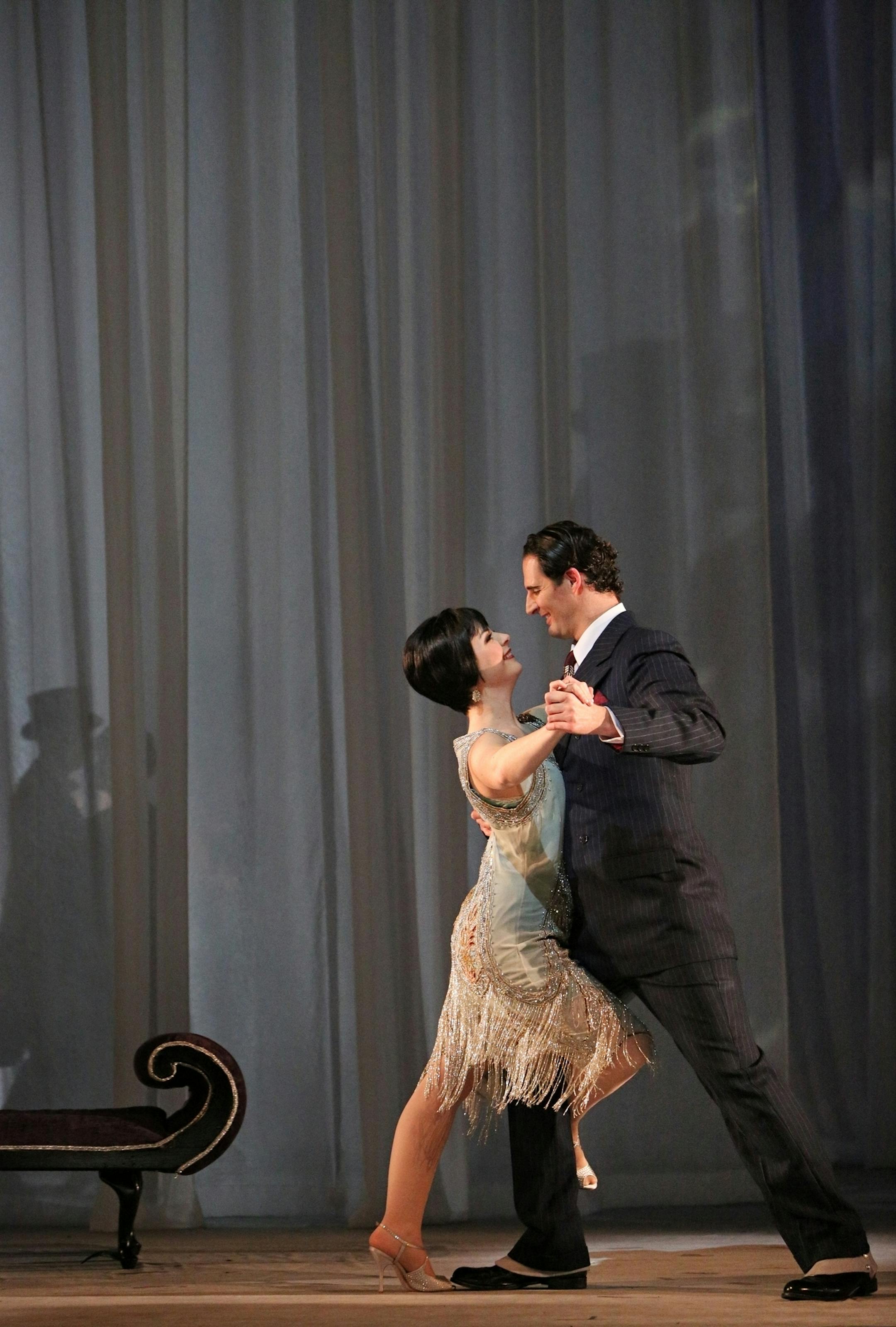 Photo by Michal Daniel Jean Acker, a young actress - Angela Mortellaro and Rudolph Valentino - James Valenti in Minnesota Opera's production of The Dream of Valentino Music by Dominick Argento?Libretto by Charles Nolte World premiere at The Kennedy Center, Washington D.C. January 15, 1994 √ä Creative Team Conductor - Christoph Campestrini Stage Director - Eric Simonson Senic Designer - Erhard Rom Projections Designer - Peter Nigrini Costume Designer - Karin Kopischke Lighting Designe