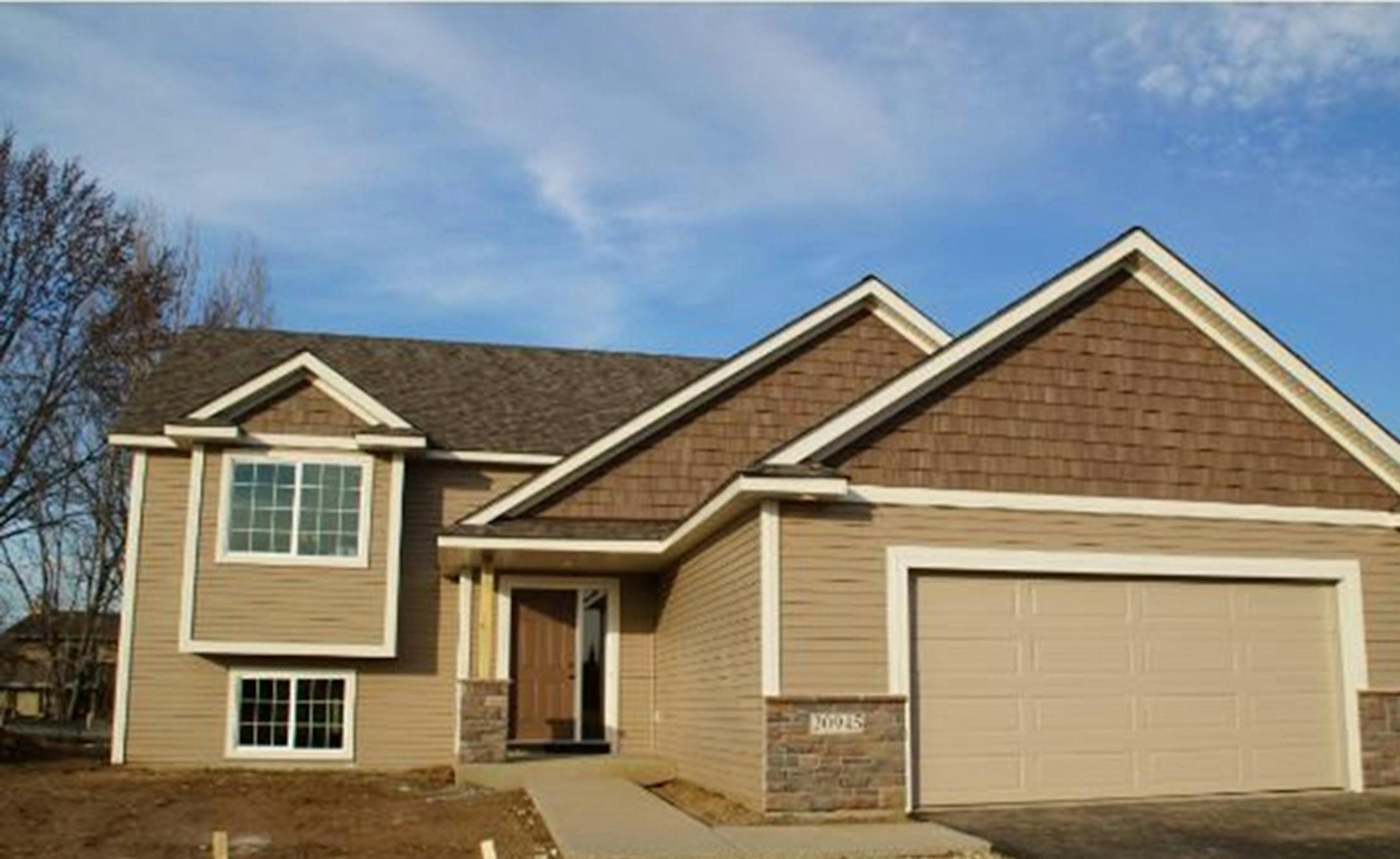 ... Farmington
Built in 2012, this five-bedroom, three-bath house has 2,378 finished square feet and features three bedrooms of one level, vaulted ceilings, solid panel doors, hardwood floors, eat-in kitchen, stainless steel appliances and lower level family room. Julie Van DeRostyne, Miles Realty, 952-841-7000.