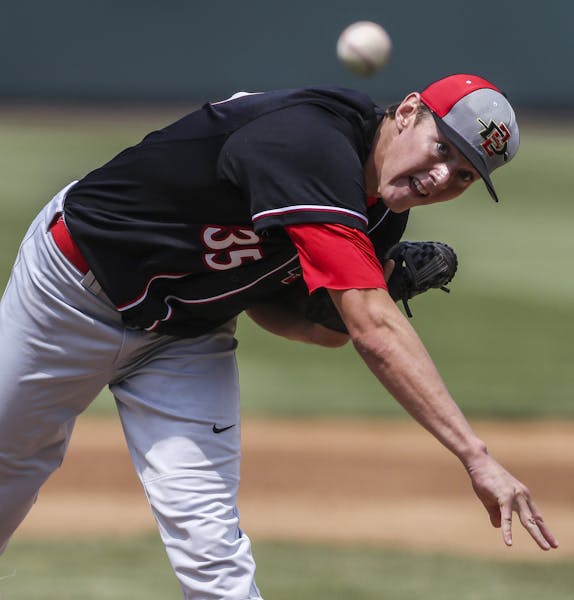 San Diego State pitcher Michael Cederoth throws to a San Diego batter during the first inning of an NCAA college baseball tournament regional game Sat