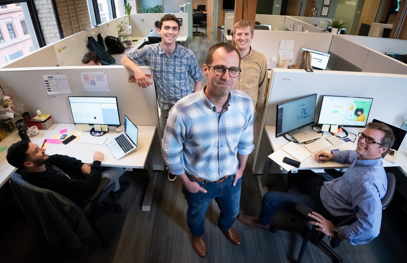 Charlie Youakim, founder and CEO of Sezzle. Behind him are co founders CTO Killian Brackey and CRO Paul Paradis. ] GLEN STUBBE &#xef; glen.stubbe@startribune.com Tuesday, October 30, 2018 Brackey on left in blue, Paradis on right in yellow. Guys on far right and left are workers. Feel free to crop them out if you like, just thought they bookended the management team nicely.