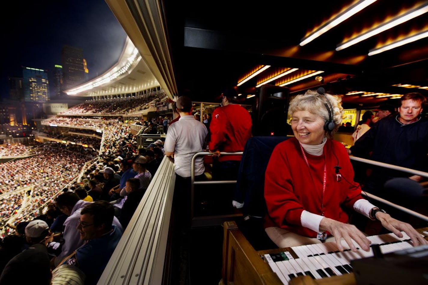 Minnesota Twins organist Sue Nelson keeps her eye on the action on the field.