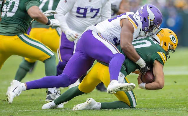 Vikings linebacker D.J. Wonnum helped make it a long day for Packers quarterback Jordan Love. 