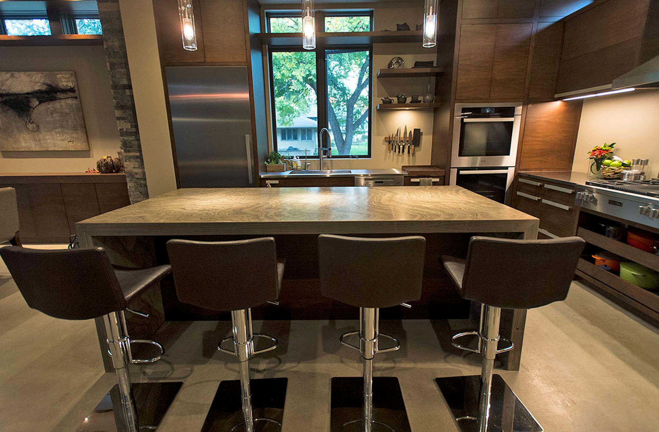 Designer Ashii Vrohidis' kitchen and other rooms are clean-lined and modern with organic and industrial elements.