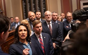 Rep. Lisa Demuth, R-Cold Spring, and Rep. Harry Niska, R-Ramsey, give a news conference after Secretary of State Steve Simon adjourned a session becau