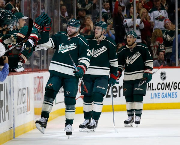 Wild left winger Thomas Vanek, left, led the parade past the Wild bench after a goal by Charlie Coyle against St. Louis in the second period Saturday.