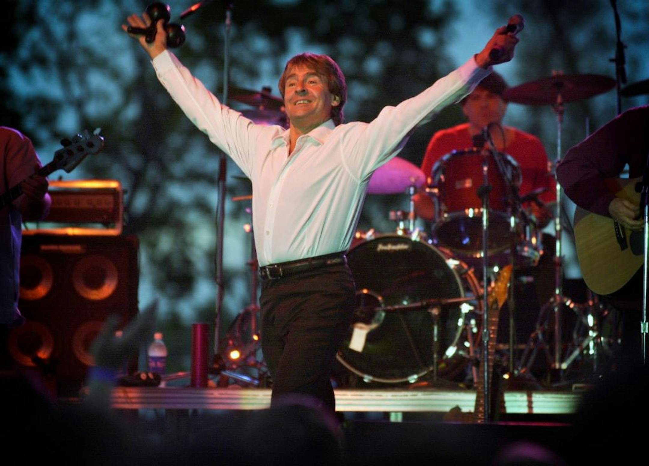 In this May 27, 2001 photo, Davy Jones and the Monkees jam at Applebees parks first concert in Lexington Ky. Jones, the diminutive heartthrob singer who rocketed to the top of the 1960s music charts by beckoning millions of adoring fans with the catchy refrains of The Monkees, died Wednesday. He was 66.