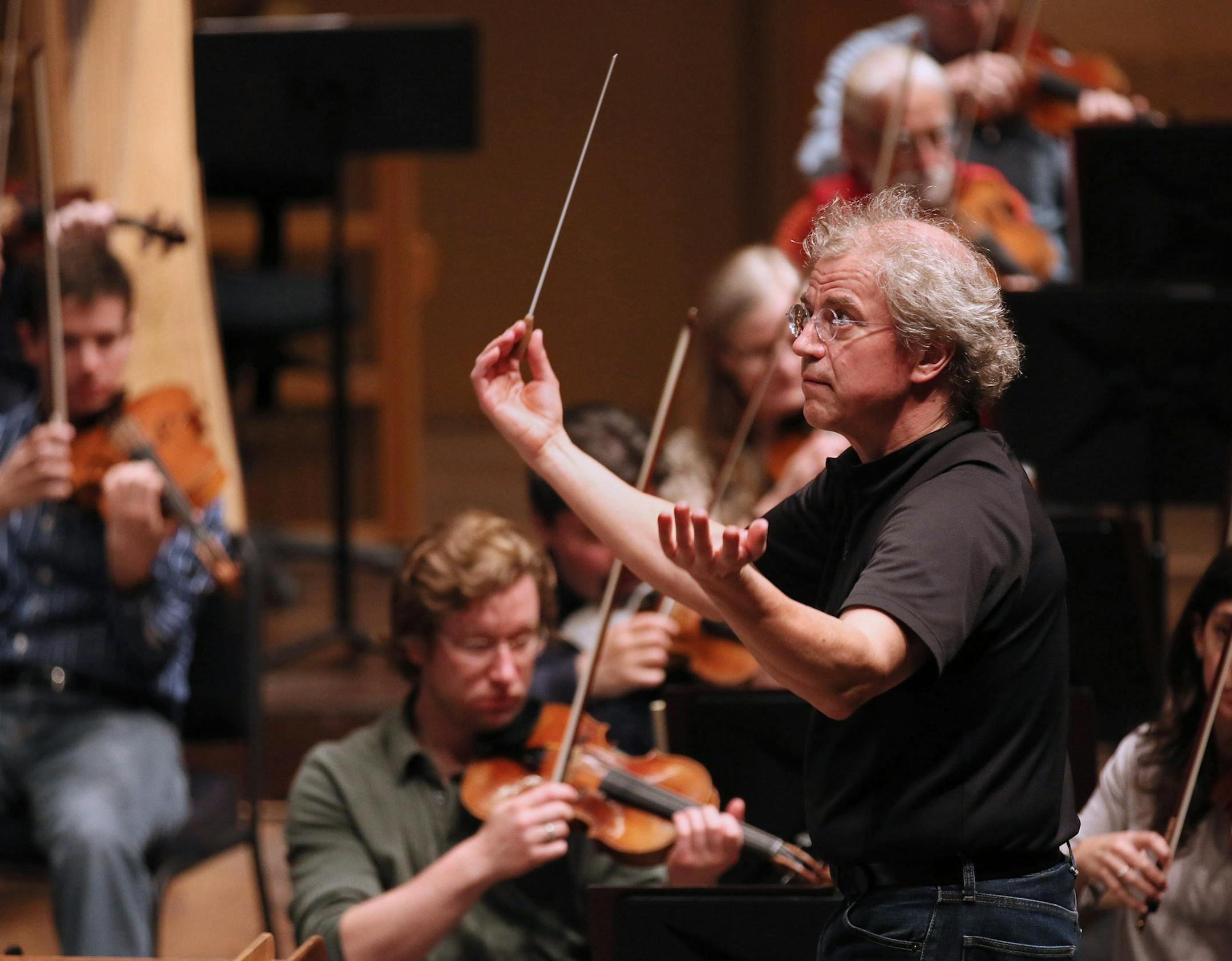 In an undatec photo members of the Minnesota Orchestra, led by Osmo Vanska, practice at Orchestra Hall in Minneapolis. The Minnesota Orchestra on Monday Sept. 30, 2013, canceled upcoming performances at Carnegie Hall due to its contract impasse with musicians ó a move that could lead to the departure of Vanska. (AP Photo/The Star Tribune, Brian Peterson) MANDATORY CREDIT; ST. PAUL PIONEER PRESS OUT; MAGS OUT; TWIN CITIES TV OUT