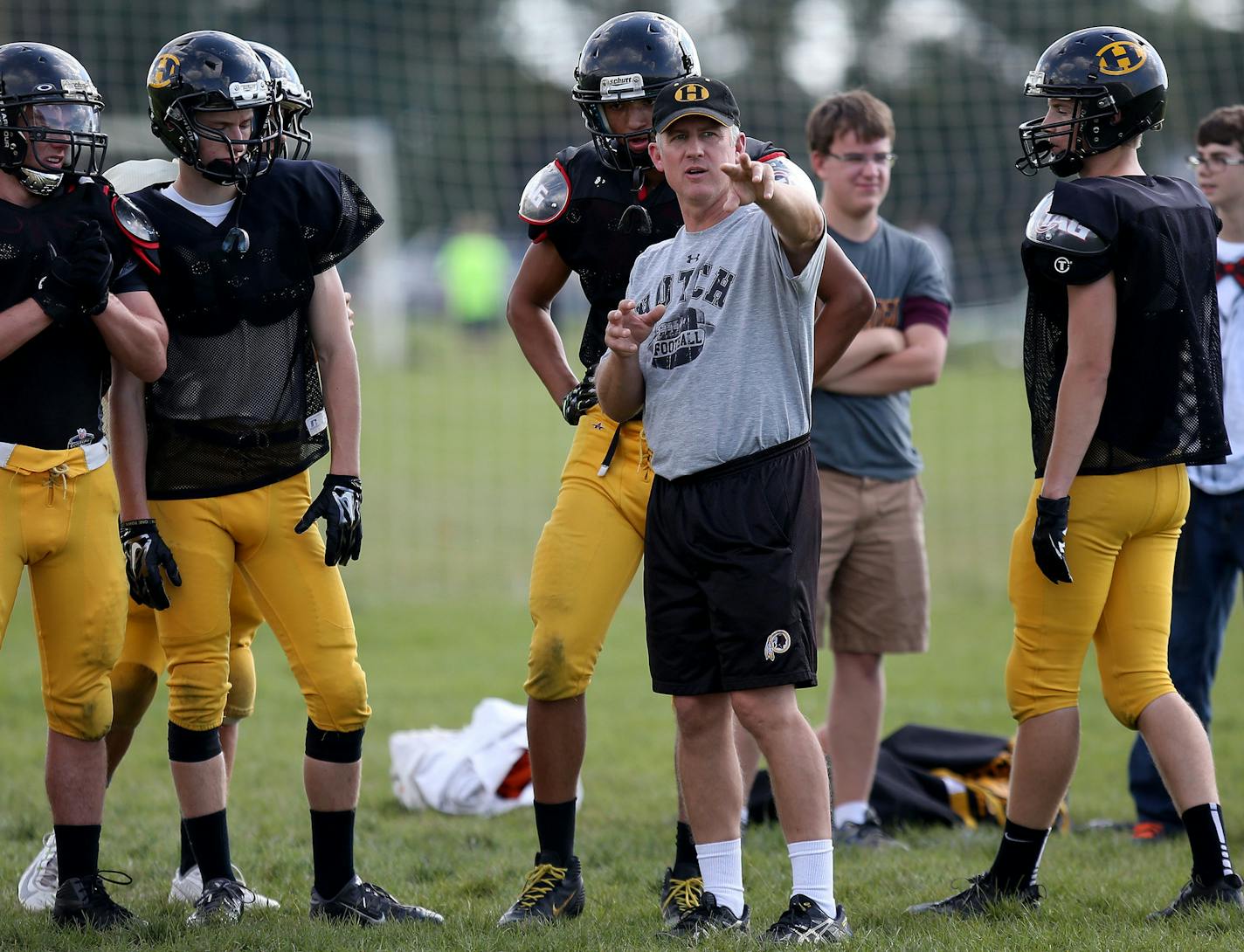 Hutchinson's head coach Andy Rostberg talked to his players during practice. ] (KYNDELL HARKNESS/STAR TRIBUNE) kyndell.harkness@startribune.com Hutchinson football practice in Hutchinson Min., Wednesday, September 17, 2014.