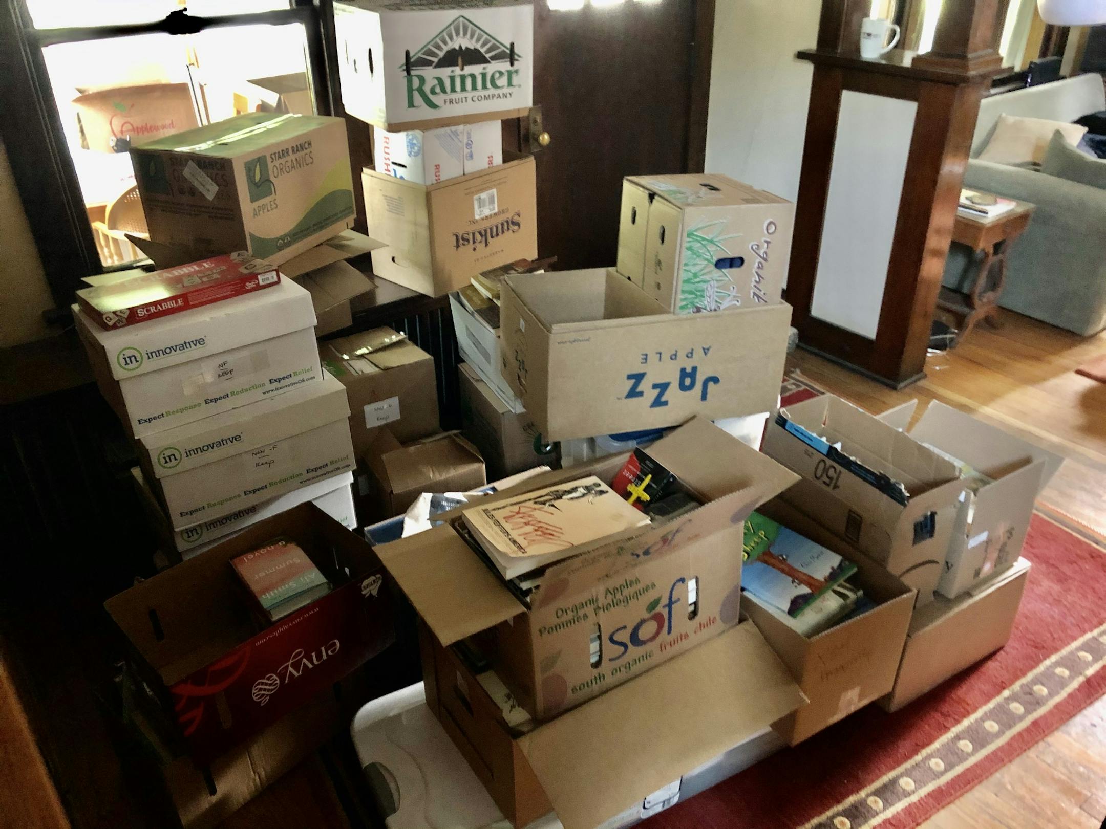 Boxes of books to both keep and give away.