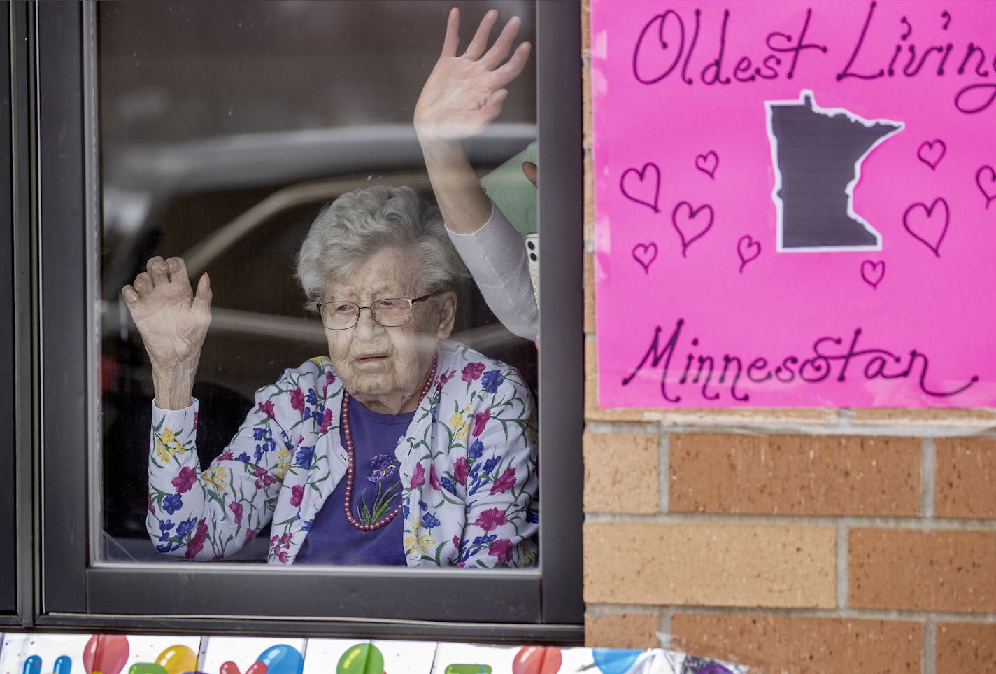 Friends and family celebrated the 112th birthday of Erna Zahn with a parade in front of her window at the Oak Hills Living Center, Tuesday, April 14, 2020 in New Ulm. Zahn is Minnesota's oldest resident.