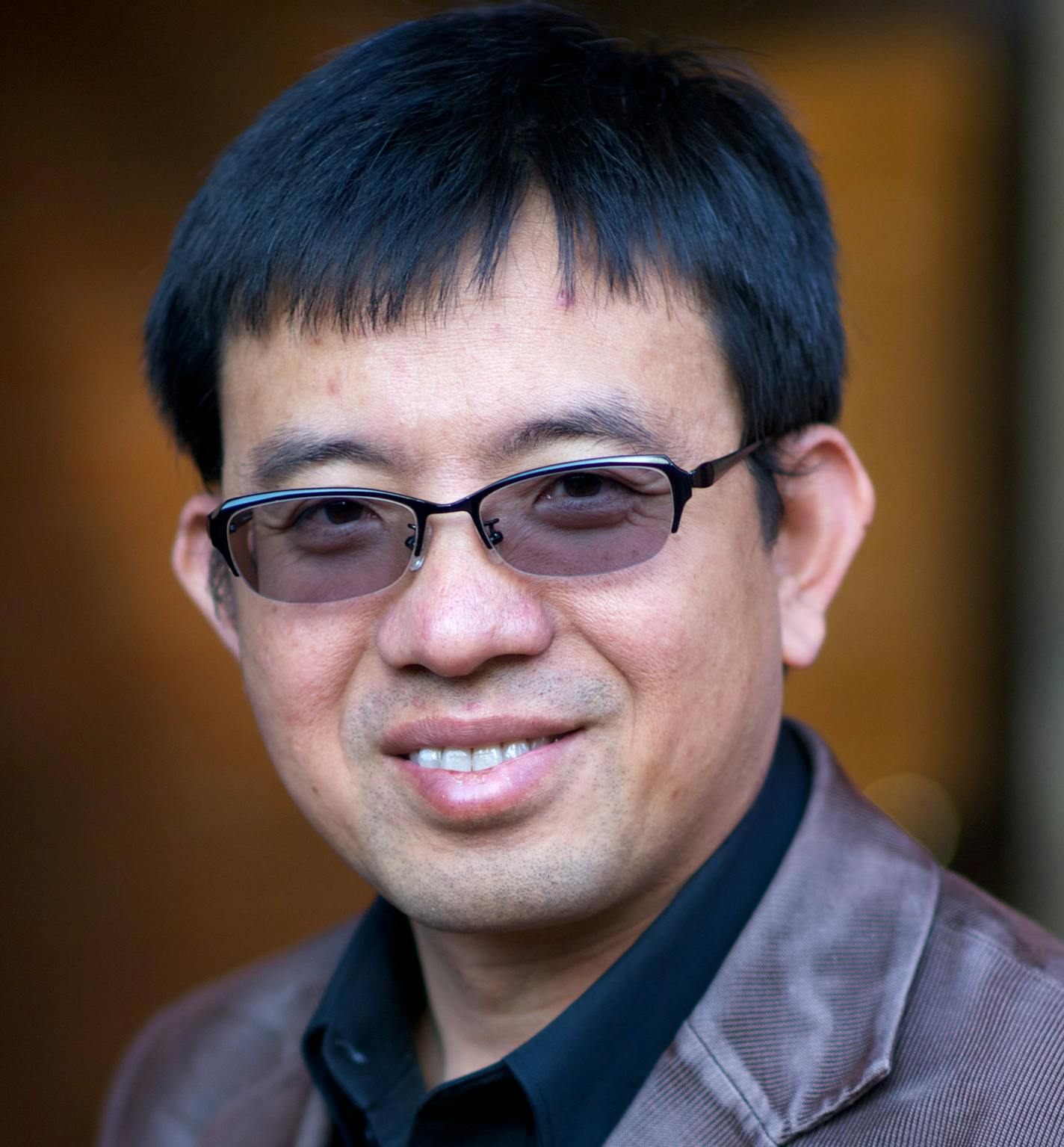 This 2013 photo provided by the University of Southern California shows USC Professor Bosco Tjan. A graduate student arrested on suspicion of stabbing Tjan to death was being held on $1 million bail Saturday, Dec. 3, 2016. David Jonathan Brown, a 28-year-old brain and cognitive science student, was arrested in the Friday afternoon attack in the heart of the Los Angeles campus. Tjan was pronounced dead at the scene. (University of Southern California via AP)