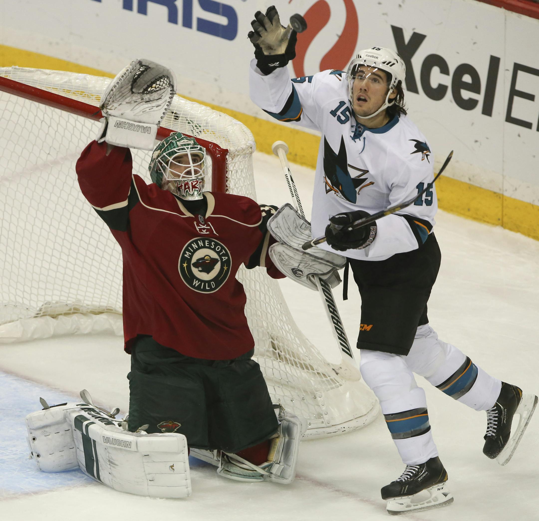 The MInnesota Wild beat the San Jose Sharks 3-1 in an NHL hockey game Sunday evening, December 8, 2013 at Xcel Energy Center in St. Paul. San Jose Sharks left wing James Sheppard (15) and Minnesota Wild goalie Josh Harding (37) both reached for a puck flying towards the Minnesota Wild goal in the third period Sunday night. ] JEFF WHEELER ‚Ä¢ jeff.wheeler@startribune.com