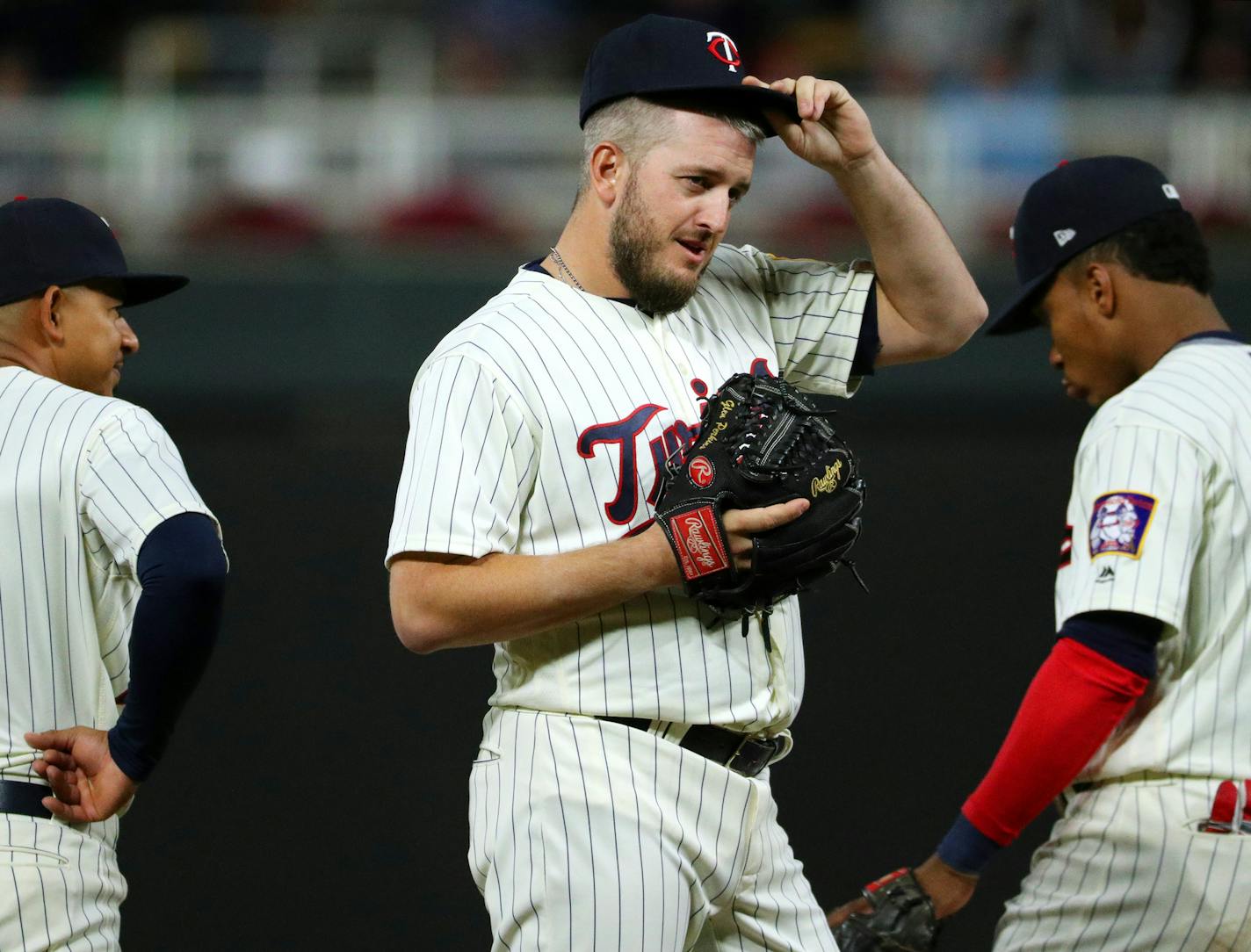 Minnesota Twins relief pitcher Glen Perkins (15) replaced Minnesota Twins relief pitcher John Curtiss (27) in the ninth inning. ] ANTHONY SOUFFLE &#xef; anthony.souffle@startribune.com Action from an MLB game between the Minnesota Twins and the Detroit Tigers Saturday, Sept. 30, 2017 at Target Field in Minneapolis.