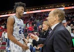 Timberwolves owner Glen Taylor and his wife Becky Mulvihill greeted Justin Patton at the end of an Iowa Wolves game. Patton was playing in his first g