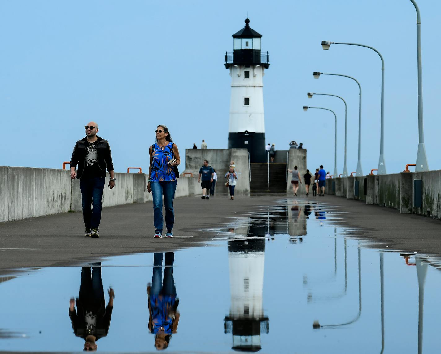 Leo Perez, a post-doctoral student living in Minneapolis, and his mother, Amara, visiting from Puerto Rico, walked along Canal Park's North Pier Wednesday afternoon. ] AARON LAVINSKY &#x2022; aaron.lavinsky@startribune.com Annual food travel issue heads to Duluth, where a lot of new restaurants are popping up. We photograph restaurants and scenic Duluth on Wednesday, June 6 and Thursday, June 7, 2018.