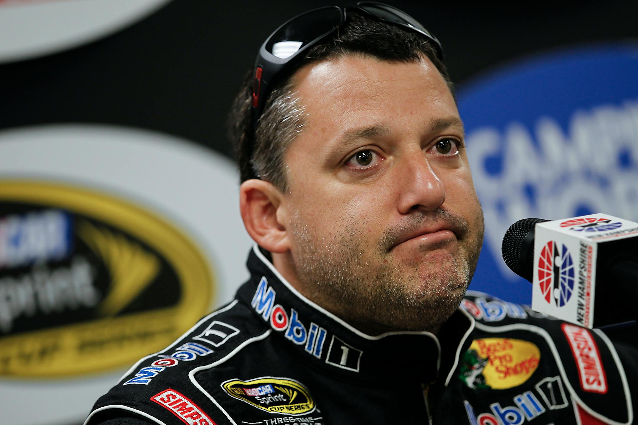 FILE - In this July 12, 2013 file photo, NASCAR driver Tony Stewart speaks at a press conference prior to NASCAR practice at the New Hampshire Motor Speedway in Loudon, N.H.