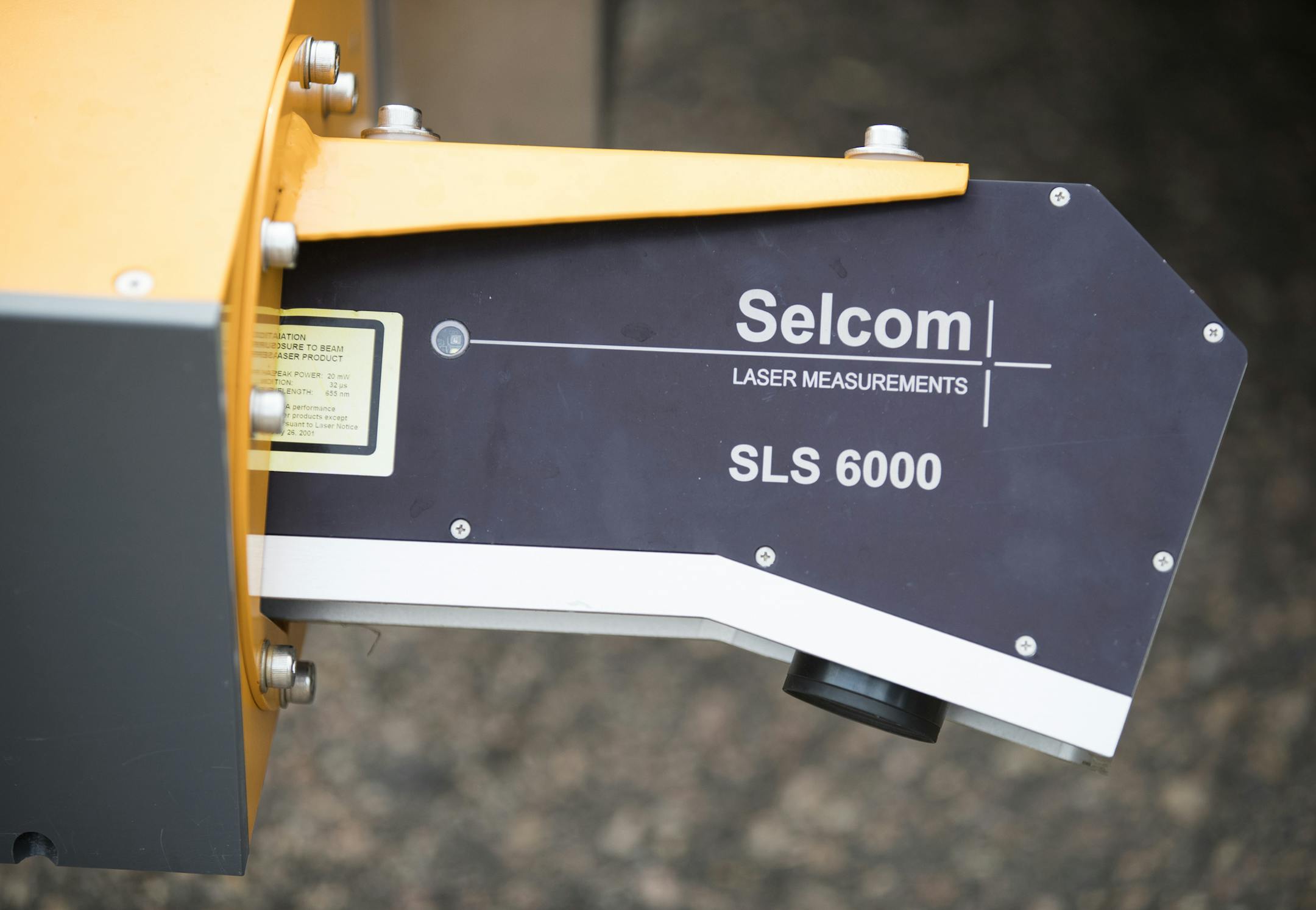 A laser mounted on the front of the Dynatest van. ] (Leila Navidi/Star Tribune) leila.navidi@startribune.com BACKGROUND INFORMATION: The Dynatest van in Minneapolis on Friday, October 14, 2016. Analyzing the condition of Minneapolis' roads will now fall to a high-tech van trolling the streets with lasers and other technology that senses whether the street is deteriorating. This van will compile the condition of city streets for the purposes of repaving and repair, a job which previously relied o