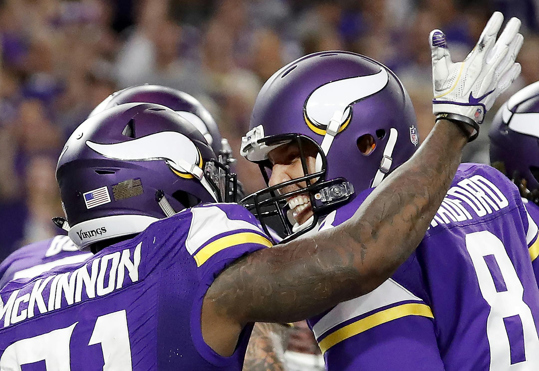 Jerick McKinnon (21) celebrated with Sam Bradford (8) after scoring a 4-yard touchdown in the fourth quarter. ] CARLOS GONZALEZ cgonzalez@startribune.com - October 3, 2016, Minneapolis, MN, US Bank Stadium, NFL, Minnesota Vikings vs. New York Giants