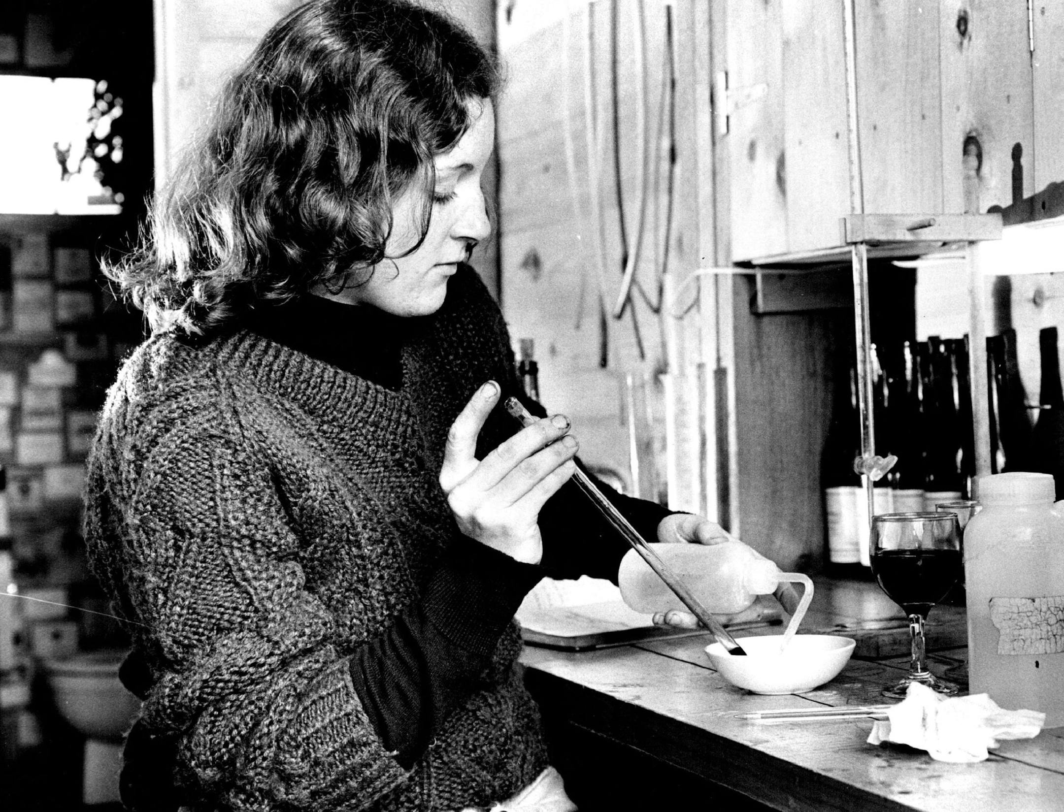 October, 29 1980 Nan Bailly tests fermenting wine for acidity Alexis Bailly - Winemaker