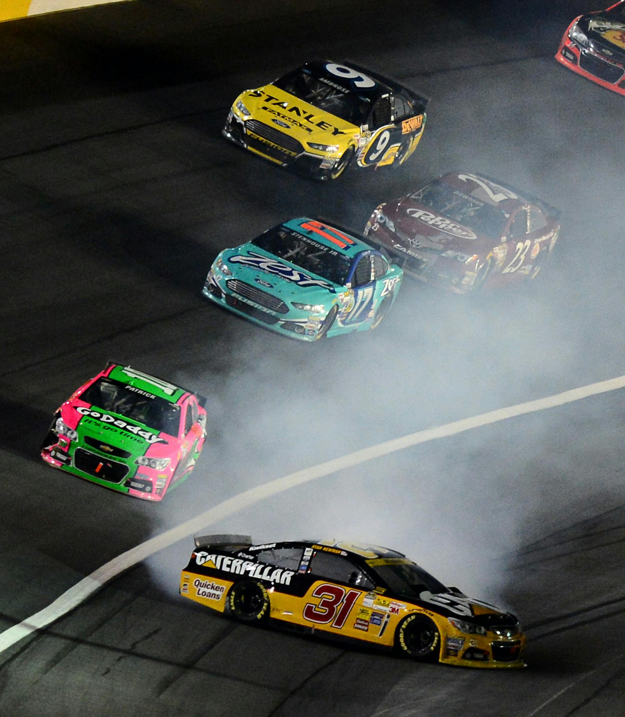 NASCAR Sprint Cup Series driver Ryan Newman (31) slides sideways coming out of Turn 4 during the Bank of America 500 at Charlotte Motor Speedway in Concord, N.C., on Saturday, Oct. 11, 2014. (Jeff Siner/Charlotte Observer/MCT)