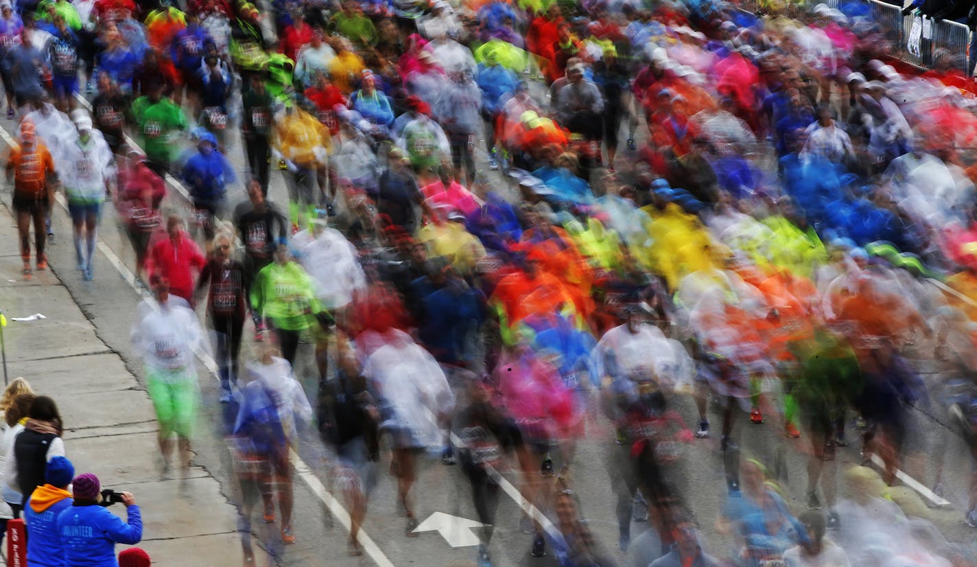 Marathon runners were off to St. Paul.] On October 5, 2014 at the start of the Twin Cities Marathon in downtown Minneapolis].Richard Tsong-Taatarii/rtsong- taatarii@startribune.com ORG XMIT: MIN1410051523131179