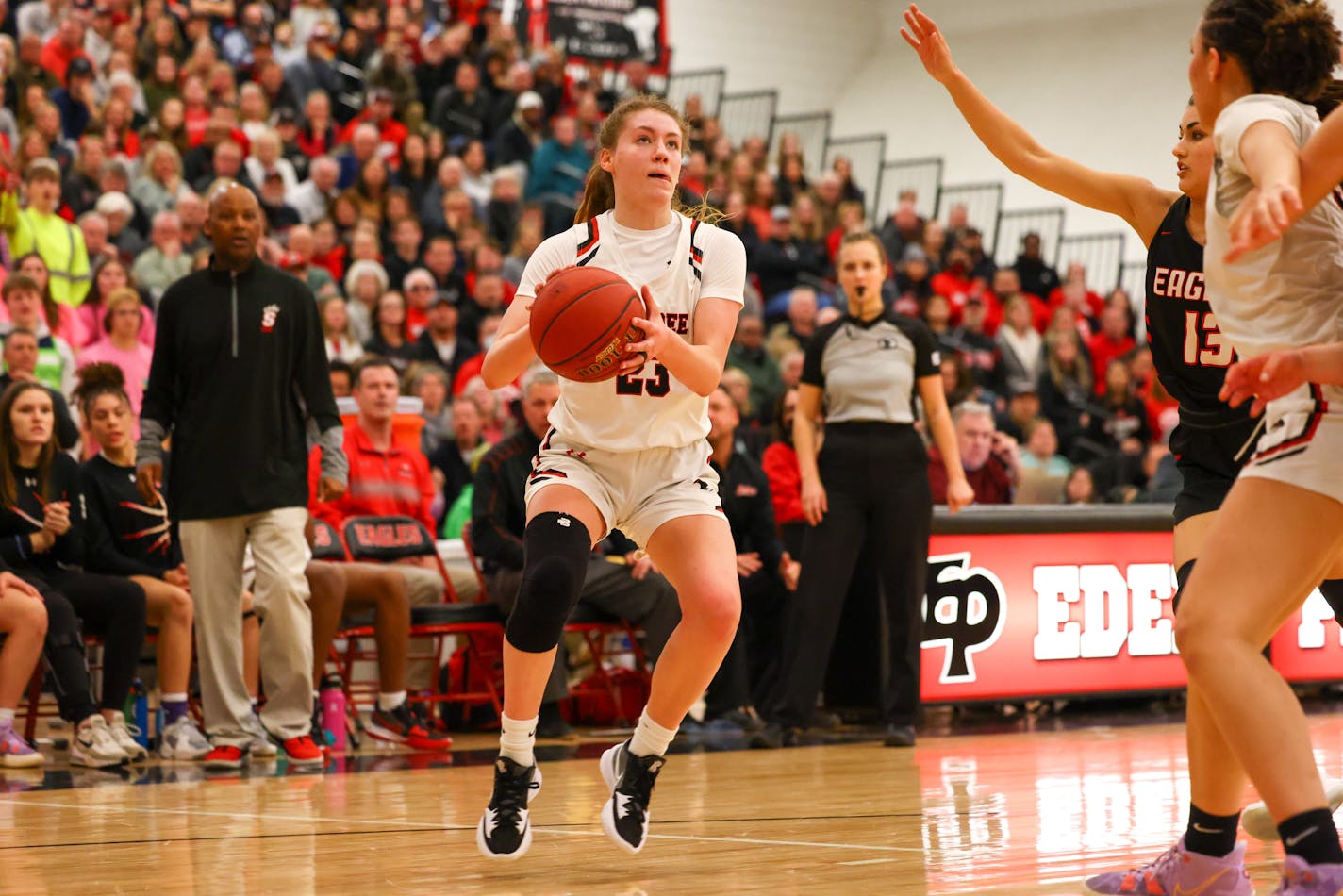 Shakopee's Kate Cordes and her teammates relied heavily on three-pointers, including Cordes' winner from beyond halfcourt. ORG XMIT: MIN2203112056210174