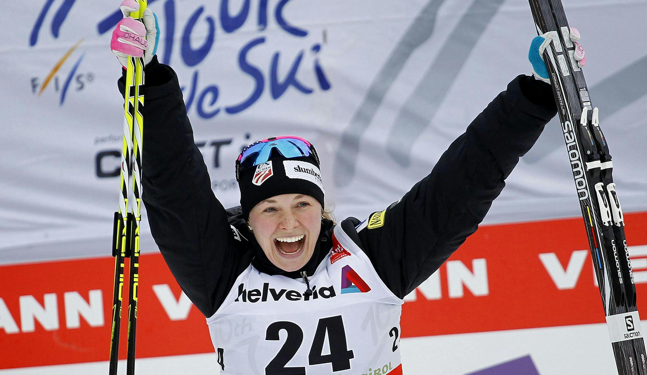 Jessica Diggins of The United States celebrates in the finish area after winning the Tour de Ski, women's 5-kilometer free pursuit cross-country ski event, in Dobbiaco (Toblach), Italy, Friday, Jan. 8, 2016. (Andrea Solero/Ansa via AP) ORG XMIT: MIN2016010819194949