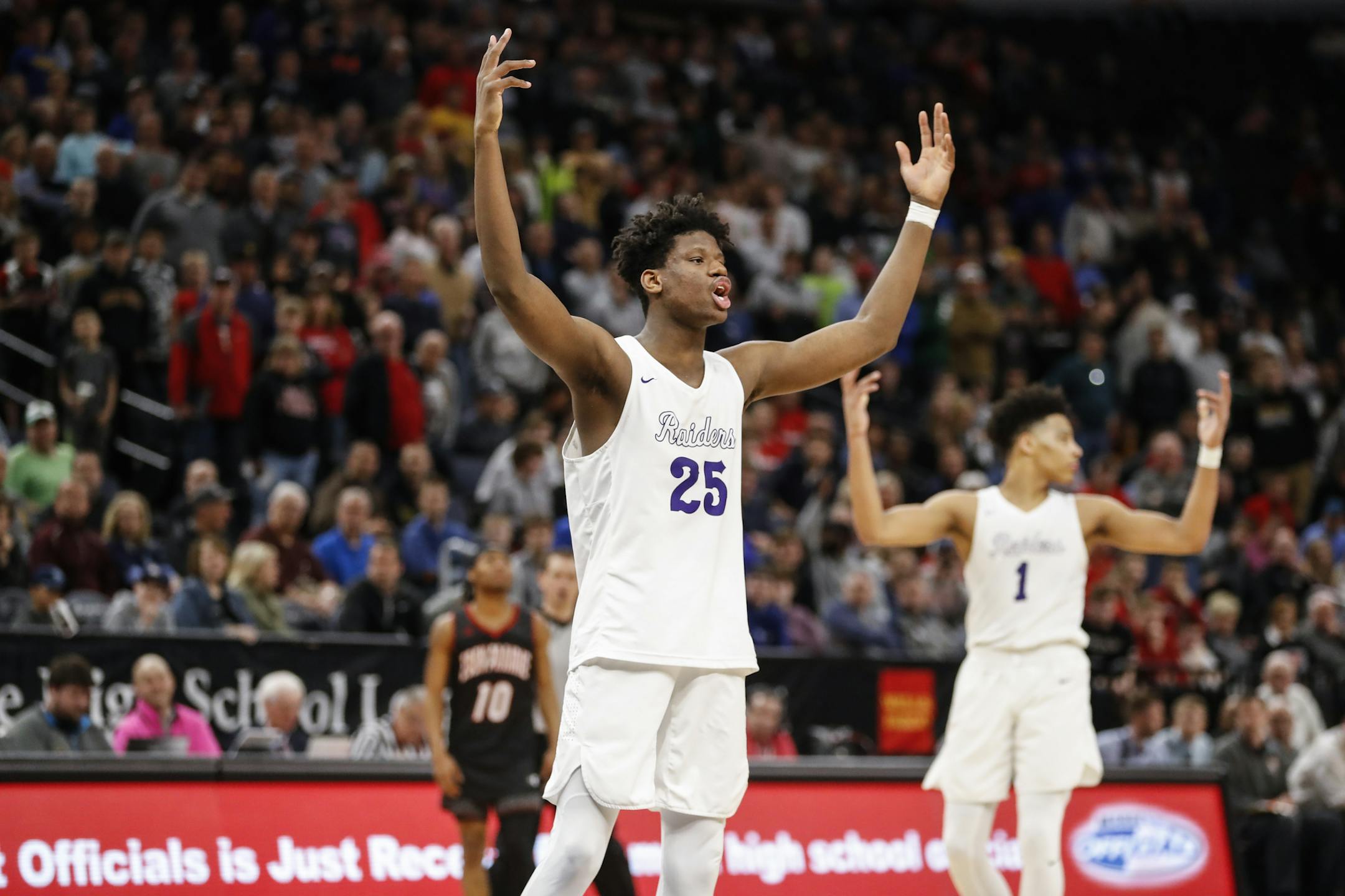 Cretin-Derham Hall forward Daniel Oturu (25) reacted to their 60-56 win over Eden Prairie. ] RENEE JONES SCHNEIDER • renee.jones@startribune.com Cretin-Derham Hall verses Eden Prairie in the boys 4A semifinals at the Target Center in Minneapolis, Minn., on March 22, 2018.