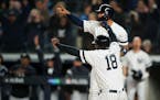 Didi Gregorius and Gleyber Torres celebrated after they scored, along with Cameron Maybin