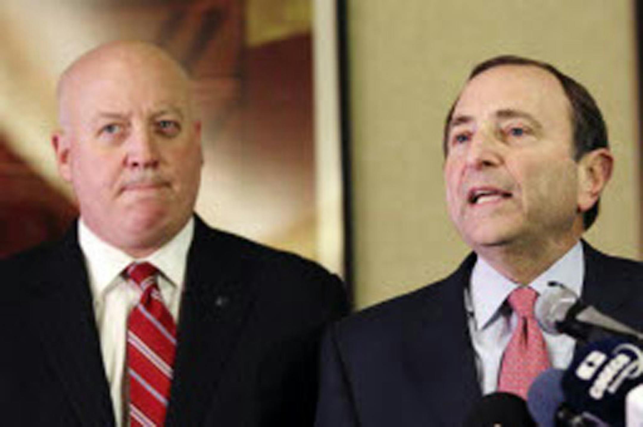 NHL Commissioner Gary Bettman (right), deputy commissioner Bill Daly