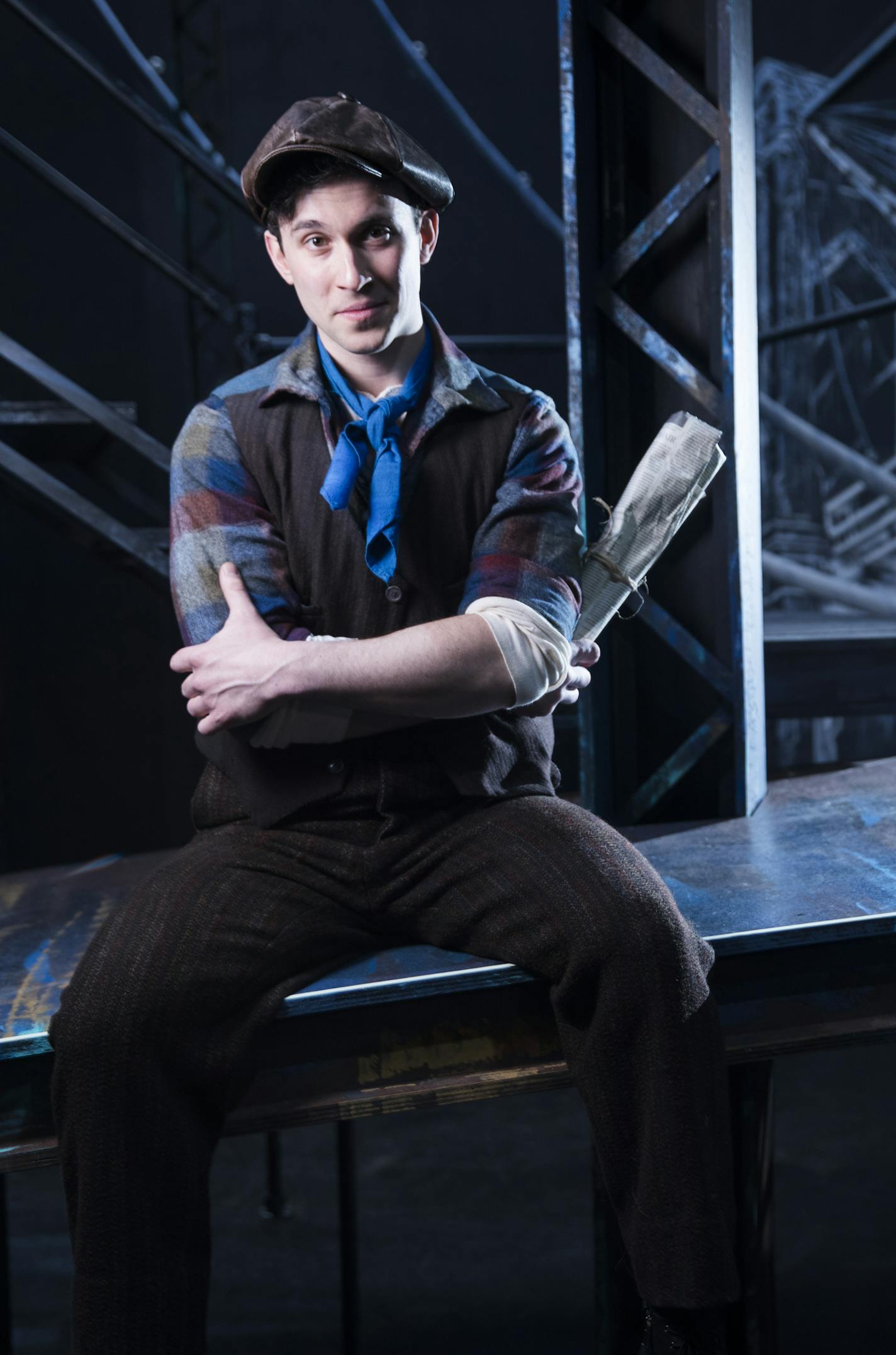 Actor Aleks Knezevich poses on stage as his character Jack Kelly in "Newsies." ] LEILA NAVIDI &#xef; leila.navidi@startribune.com BACKGROUND INFORMATION: Feature on Serbian-born actor Aleks Knezevich, a leading man who dropped out of medical school after a year in order to pursue a life singing and dancing onstage. He has found something of a home at Chanhassen Dinner Theatres, where he stars in "Newsies." Photographed at Chanhassen Dinner Theatres on Tuesday, February 27, 2018.