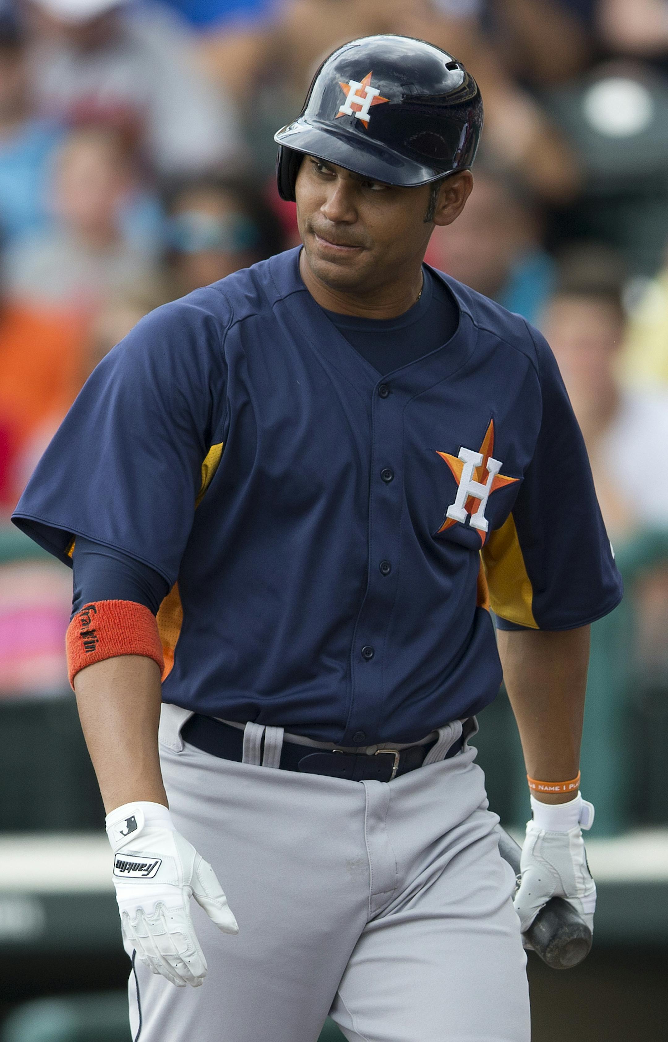 Houston Astros' Carlos Pena stares at Atlanta Braves pitcher Julio Teheran after he struck out during the first inning of an exhibition spring training baseball game on Saturday, March 23, 2013, in Kissimmee, Fla. (AP Photo/Evan Vucci)